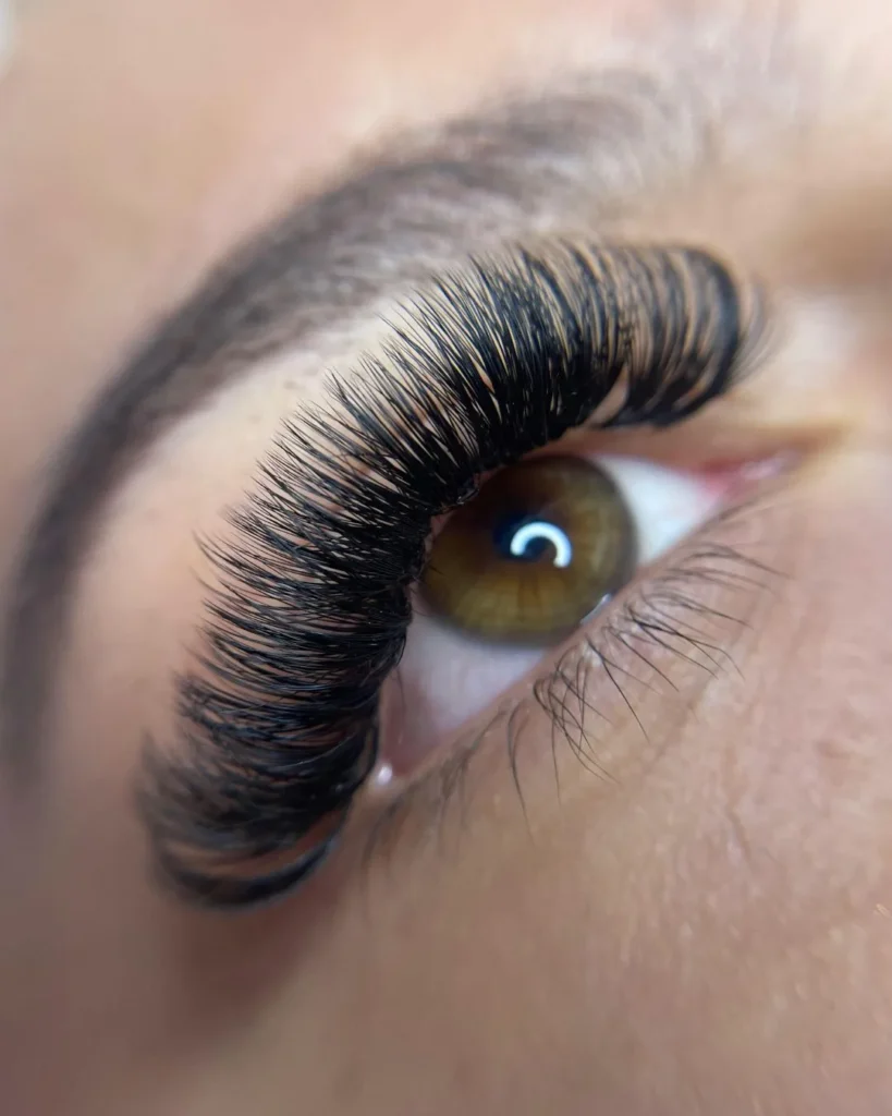 Close up of full volume lash extensions after a lash fill at a Dallas lash studio